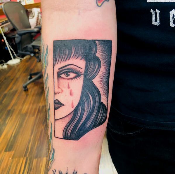 Girl with Tears Tattoo